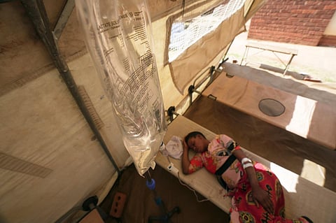 A cholera patient lies on a hospital bed in Harare, Zimbabwe, Sunday Nov. 19, 2023. (Photo | AP)