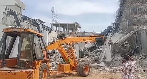 The wall of an under-construction private indoor stadium collapsed in Moinabad | Videograb