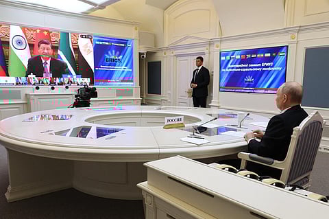 This pool photograph distributed by Russian state agency Sputnik shows Russia's President Vladimir Putin attending a virtual summit of the BRICS group of nations on November 21, 2023. (Photo | AFP)