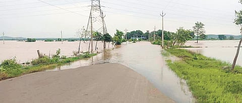 A file photo of Peddapalli- Manthani Road inundated by Godavari flood waters.