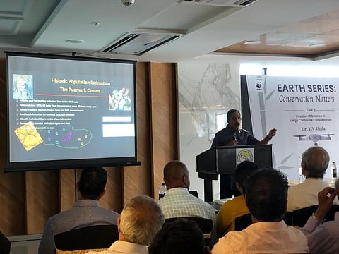 Dr Y V Jhala delivering his talk, Infusion of Science in Large Carnivore Conservation, emphasizing the significance of science in wildlife conservation.