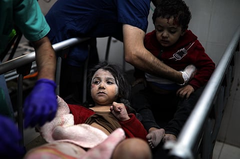 Wounded Palestinian children receive medical treatment at the Nasser Hospital following an Israeli bombardment on Khan Younis refugee camp, southern Gaza Strip on November 21. (Photo | AP)