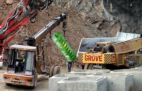 Drilling equipments being brought at the Silkyara tunnel site during the rescue operation of 41 workers trapped inside the tunnel for 10 days, on Wednesday, Nov. 22, 2023. (Photo | PTI)