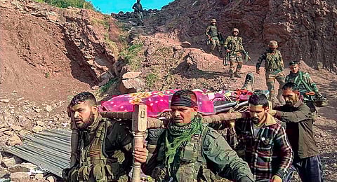 Army personnel and locals carry the body of an army officer near the site of an encounter with terrorists at Kalakote area, in Rajouri district, Wednesday, Nov. 22, 2023. (PTI)