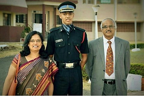 Martyred Captain MV Pranjal (center) with his parents (Photo | Special Arrangement)