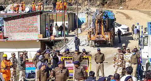 Rescue and relief operation underway after a portion of a tunnel under construction between Silkyara and Dandalgao collapsed, in Uttarkashi district. (Photo | PTI)