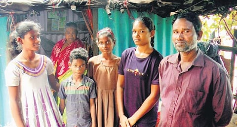 Laxmi, (second from right) with her father and other family members in their house at the Mundapada slum in Paradip | Express