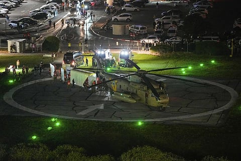 A helicopter carrying hostages released by Hamas lands at Schneider Children's Medical Center in Petah Tikva, Israel on Friday, Nov. 24, 2023. (Photo | AP)