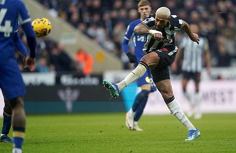 Newcastle United's Joelinton has a shot on goal, during the Premier League match against Chelsea. (Photo | AP)