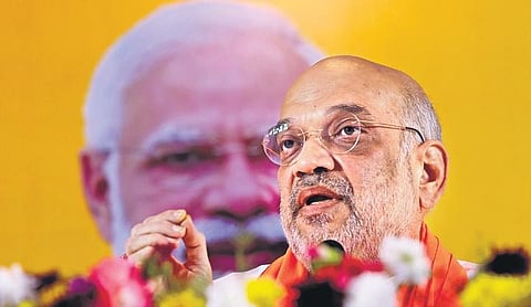 Union Home Minister Amit Shah gestures while speaking during a press conference in Hyderabad on Saturday | Sri Loganathan Velmurugan