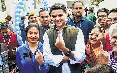 Sachin Pilot and other voters show their fingers marked in Jaipur on Saturday, Nov 25, 2023. (Photo | PTI)