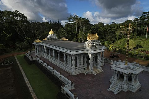 The sun shines down on the golden spires of the Iraivan Temple at Kauai's Hindu Monastery, on July 10, 2023, in Kapaa, Hawaii. (Photo | AP)