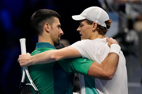 FILE - Italy's Jannik Sinner (right), embraces Serbia's Novak Djokovic at the end of the singles tennis match of the ATP World Tour Finals on Tuesday, November 15, 2023. (Photo | AP)