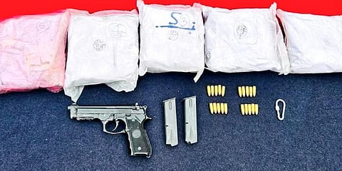 BSF Punjab Frontier's troops recovered a Pistol, 2 Magazines, 20 live rounds and 5.240kg of heroin from Chak Allah Baksh Village (Photo | Twitter)