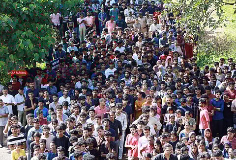 Hundreds waiting to pay respects to the mortal remains of the students who passed away in the stampede at CUSAT.