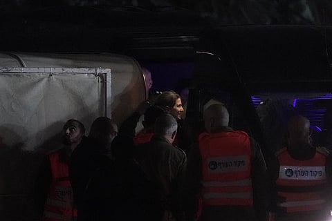 Released hostages get-off a helicopter after being released from Gaza by Hamas. (Photo | AP)