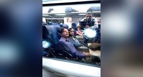 The damaged windowpane of Puri-Rourkela Vande Bharat Express