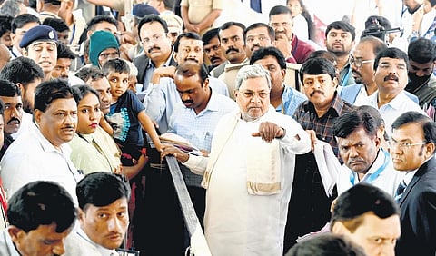 Chief Minister Siddaramaiah interacts with citizens during a Janaspandana programme at his official residence in Bengaluru on Monday | NAGARAJA GADEKAL