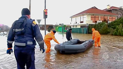 Russian Emergency Ministry rescuers arrive to evacuate people after storm and flooding near Evpatoria in Crimea. (Photo | AP)