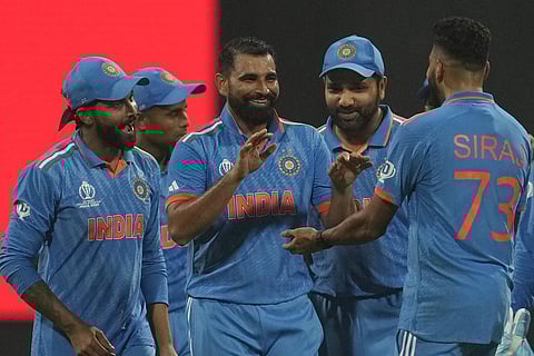 Mohammed Shami celebrates a wicket against Sri Lanka with Mohammed Siraj (Photo | AP)