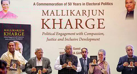 Congress President Mallikarjun Kharge with party's senior leader Sonia Gandhi and other leaders at the launch of his biography in New Delhi, Wednesday, Nov. 29, 2023. (PTI)
