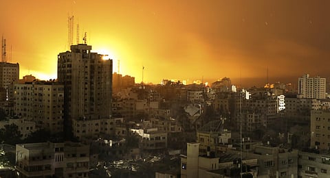 Fire and smoke rises from buildings following Israeli airstrikes on Gaza City, Sunday, Nov. 5, 2023. (AP Photo)