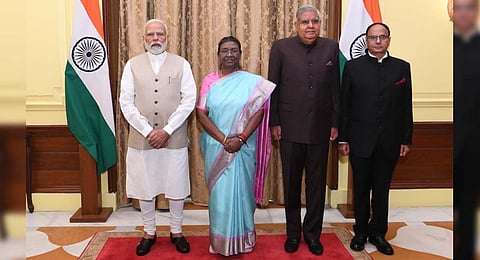 President Droupadi Murmu, Vice President Jagdeep Dhankhar and Prime Minister Narendra Modi with newly sworn in CIC Heeralal Samariya at Rashtrapati Bhavan. (Photo | PTI)
