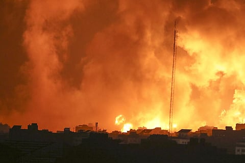 Fire and smoke rises from buildings following Israeli airstrikes on Gaza City, Sunday, Nov. 5, 2023. (Photo | AP)