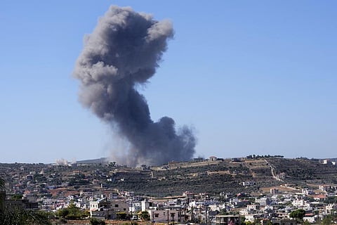 Black smoke rises from an Israeli airstrike on the outskirts of Aita al-Shaab, a Lebanese border village with Israel, south Lebanon, on Nov 4, 2023. (AP)