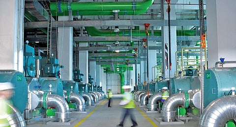 Chilled water is transferred to buildings through underground network of insulated pipes in district cooling system | express