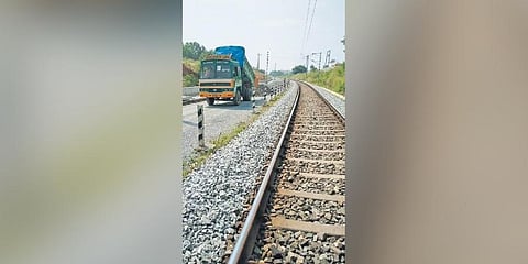 The spreading of ballast underway in connection with doubling between Bellandur Road railway station and Karmelaram railway stations