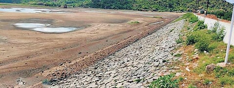 View of the dry Ghodahada reservoir in Digapahandi block of Ganjam. (Photo| Express)
