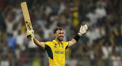 Australia's Glenn Maxwell celebrates after their win in the ICC Men's Cricket World Cup match against Afghanistan in Mumbai.(Photo | AP)
