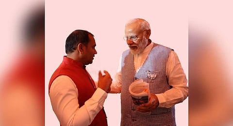 Pulsus Group CEO Gedela Srinubabu with prime minister Narendra Modi in Hyderabad on Tuesday. (Express)