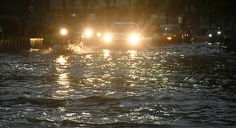Water logged roads after sudden downpour in Vijayawada on Wednesday. (Photo | Prasant Madugula)