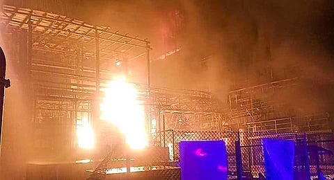 Flame billows out after a fire broke out at a chemical plant following an explosion in a storage tank, injuring 24 workers, in Gujarat's Surat, Wednesday, Nov. 29, 2023. (PTI)