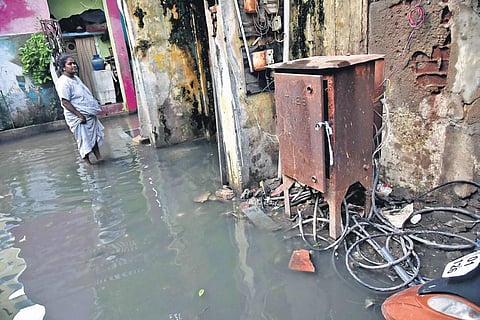Electric cables loosely connected to a ‘power box’ at Venkatammal Samadi Street at Purasaivakkam, posing a threat to the residents during rainy days. (Photo | P Jawahar)