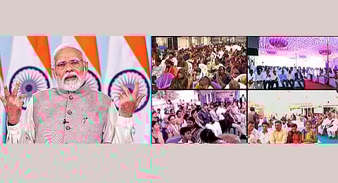 Prime Minister Narendra Modi addresses beneficiaries of 'Viksit Bharat Sankalp Yatra' via a video conference, on Thursday, Nov. 30, 2023. (PTI)