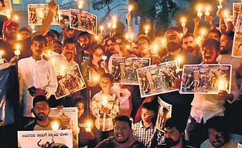 A candlelight protest was held demanding a probe into the death of Dasara elephant Arjuna in Mysuru on Sunday | Udayashankar S