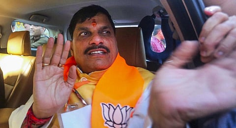 BJP MLA Mohan Yadav after being elected as the new Chief Minister of Madhya Pradesh, at party headquarters in Bhopal on Monday. (Photo | PTI)