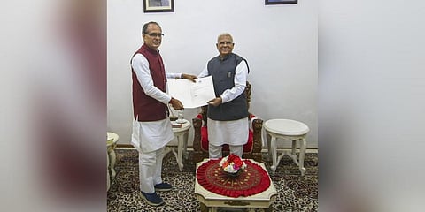 Madhya Pradesh Chief Minister Shivraj Singh Chouhan tenders his resignation from the post of Chief Minister to Governor Mangubhai Patel, at Raj Bhavan in Bhopal. (Photo | PTI)