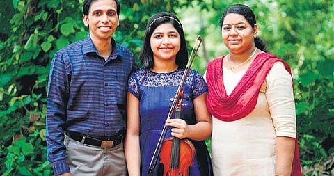 Martina with her parents