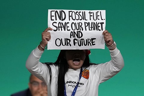 Indian climate activist Licypriya Kangujam protests against the use of fossil fuels during an event at the COP28 UN Climate Summit, Monday, Dec. 11, 2023, in Dubai, UAE. (AP Photo)