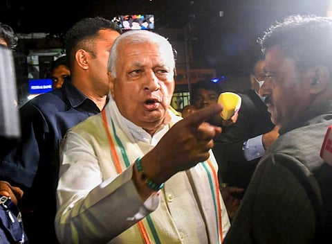 Kerala Governor Arif Mohammed Khan reacts after being allegedly mobbed by SFI students on his way to the airport, in Thiruvanathapuram, Monday, Dec. 11, 2023 | PTI