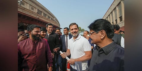 : Congress MP Rahul Gandhi with others during the Winter session of Parliament, in New Delhi. (Photo | PTI)