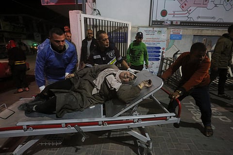Palestinians wounded in the Israeli bombardment of the Gaza Strip are brought to a hospital in Rafah on Monday, December 11, 2023. (Photo | AP)