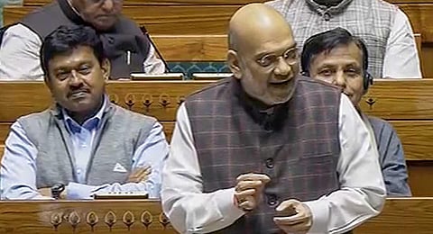 Union Home Minister Amit Shah speaks in the Lok Sabha during the Winter session of Parliament, in New Delhi, Tuesday, Dec. 12, 2023. (PTI )