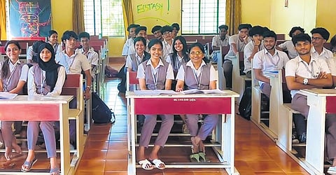 Anita with her classmates at Vidya Academy of Science and Technology