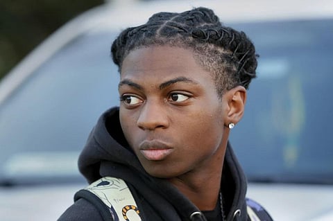 FILE - Darryl George, looks on before walking into Barbers Hill High School after serving an in-school suspension for not cutting his hair, Sept. 18, 2023, in Mont Belvieu, Texas. (Photo | AP)