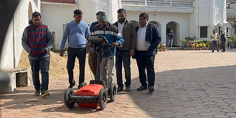 The Income Tax sleuths using Ground penetrating Radar (GPR) to find the treasures hidden under the ground at Sahu’s Lohardaga residence in Jharkhand. (Photo | Express)